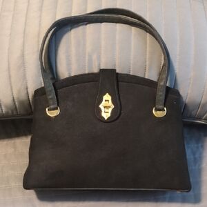 Chic Black Mini Bag with Gold Accents